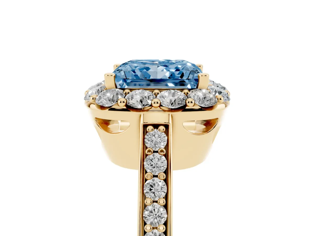 Fancy Blue Princess Cut Diamond Floral Halo Ring with Pavé Band and Prong Setting Yellow gold