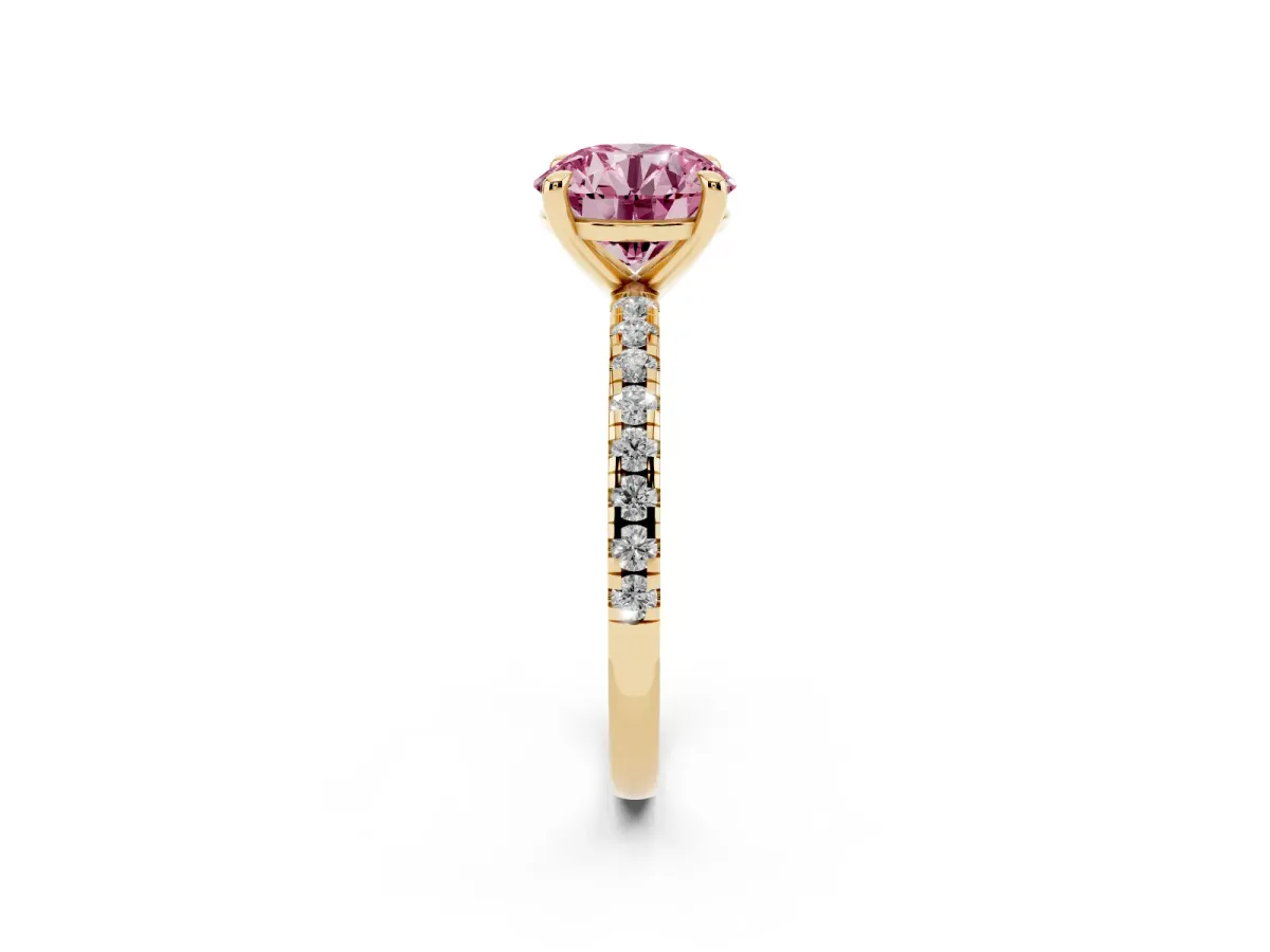 Fancy Pink Round Cut Diamond Brilliant Solitaire Ring with Pavé Band and Four-Prong Setting Yellow gold
