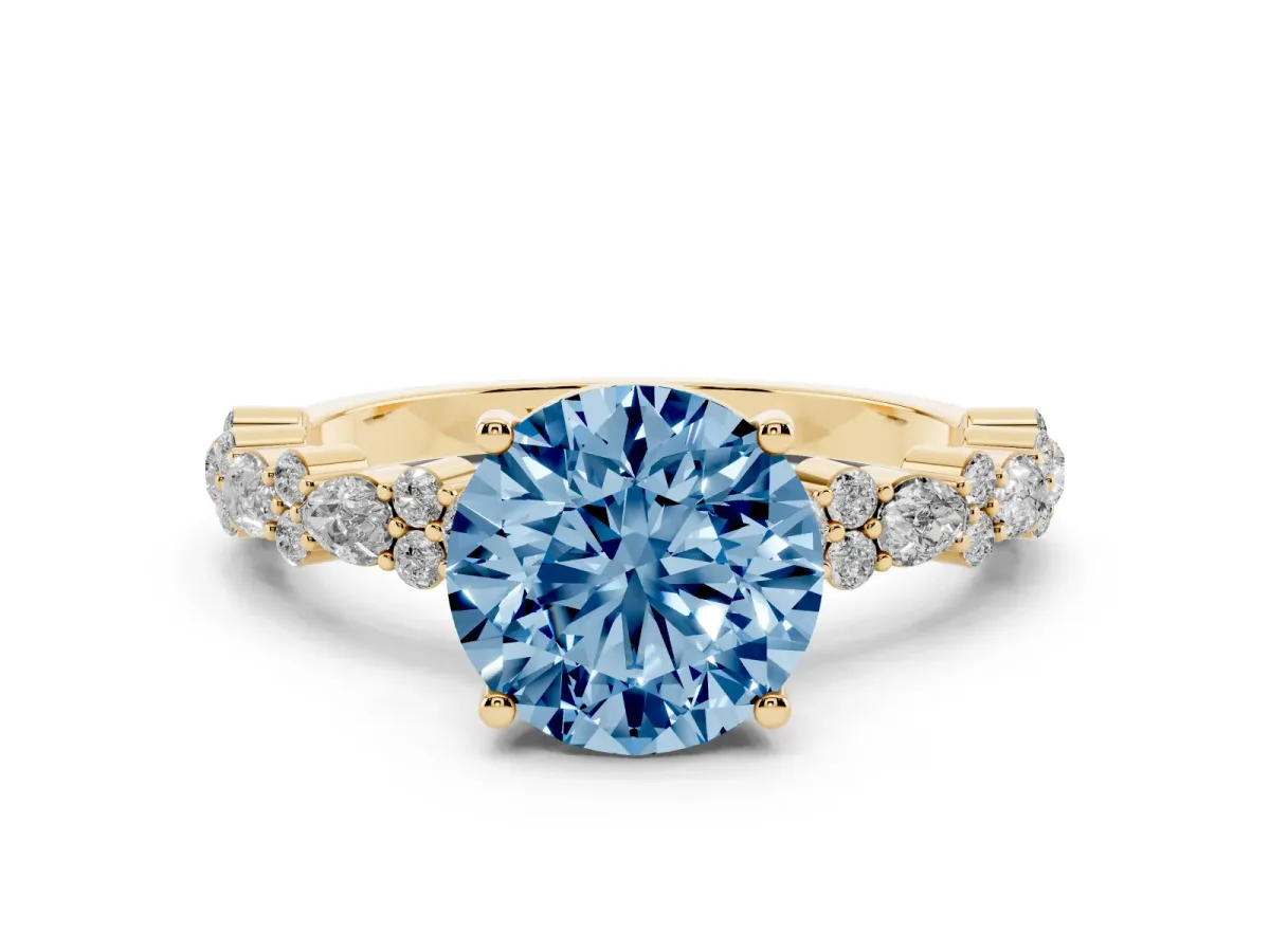 Fancy Blue Round Cut Diamond Side Stone Solitaire Ring with Round and Four-Prong Setting Yellow gold