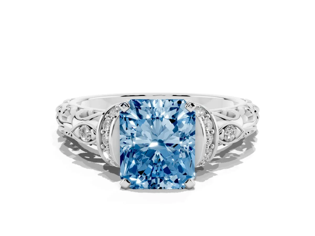 Fancy Blue Radiant Cut Diamond Solitaire Ring with Filigree Band and Four-Prong Setting Silver