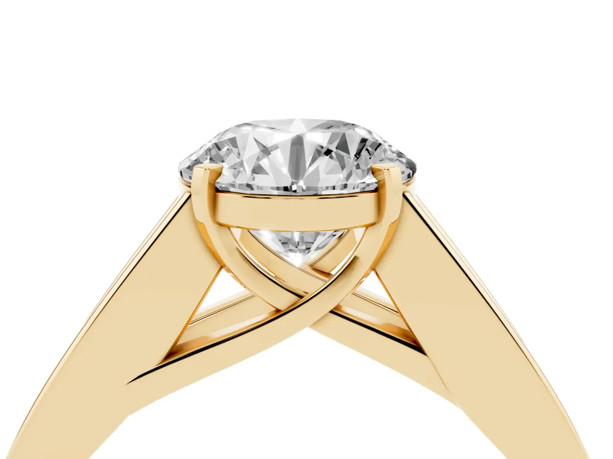 Round Cut Cut Channel Set Solitaire Ring with Four-Prong Setting Yellow gold