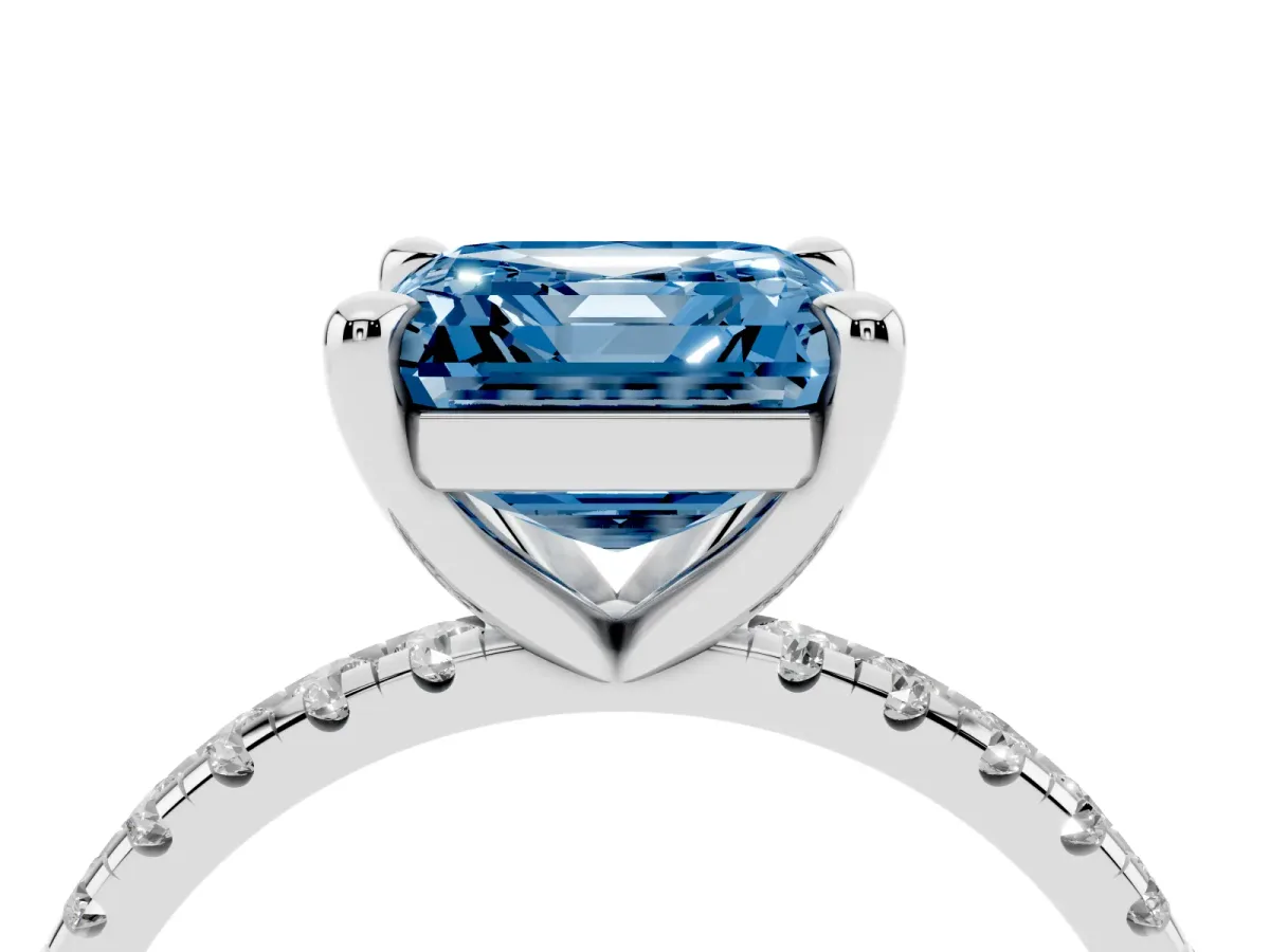 Fancy Blue Asscher Cut Diamond Brilliant Solitaire Ring with Pavé Band and Four-Prong Setting White gold