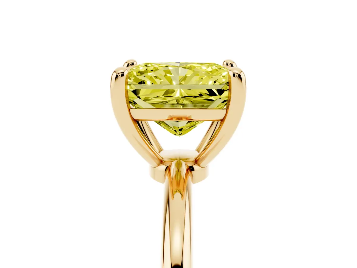 Fancy Yellow Radiant Cut Solitaire Diamond Ring with 4-Prong Setting on a Classic Band Yellow gold