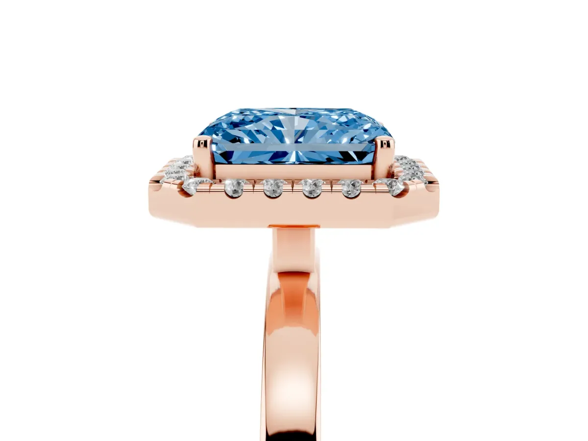 Fancy Blue Radiant Cut Halo Diamond Solitaire with Pavé Band and Four-Prong Setting Rose gold