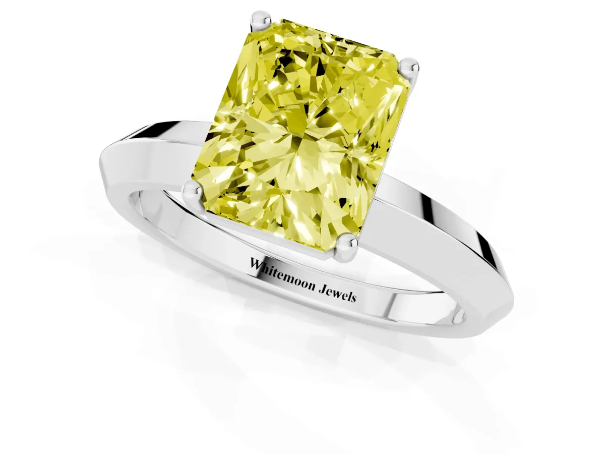 Fancy Yellow Radiant Cut Cut Solitaire Engagement Ring with Flat Band and Four-Prong Setting Platinum