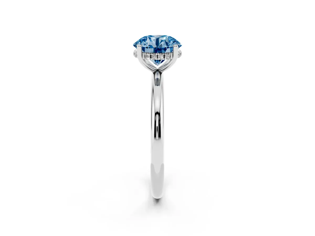 Fancy Blue Round Cut Cut Solitaire Engagement Ring with Four-Prong Setting and Classic Band Silver