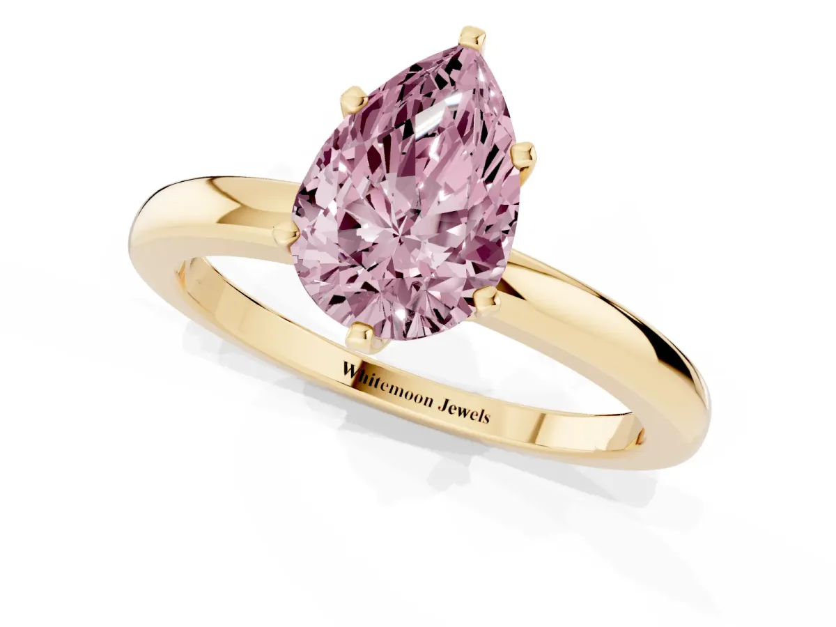 Fancy Pink Pear Cut Solitaire Diamond Ring with Six-Prong Setting on a Classic Band Yellow gold