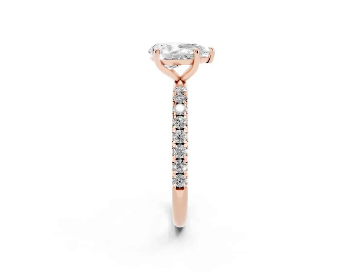 Pear Cut Cut Diamond Solitaire Ring with Micro Pave Band and Four Prong Setting Rose gold