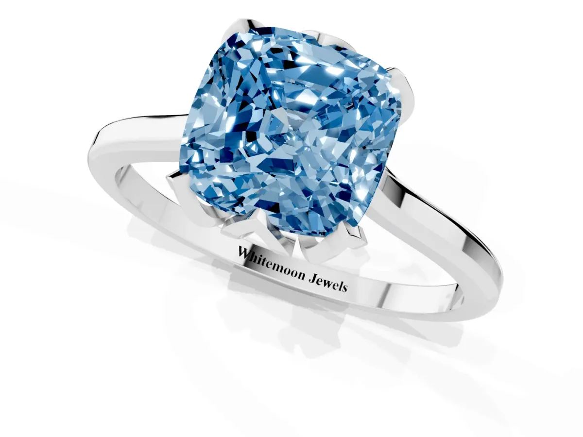 Fancy Blue Cushion Cut Diamond Solitaire Ring with Flower Prong Setting and Classic Band Silver