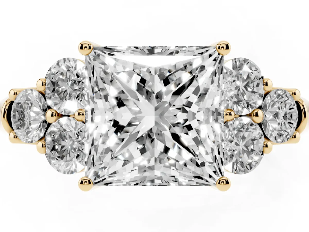 Princess Cut Cut Diamond Cluster Ring with Round Accent Stones and Prong Setting on a Classic Band Yellow gold