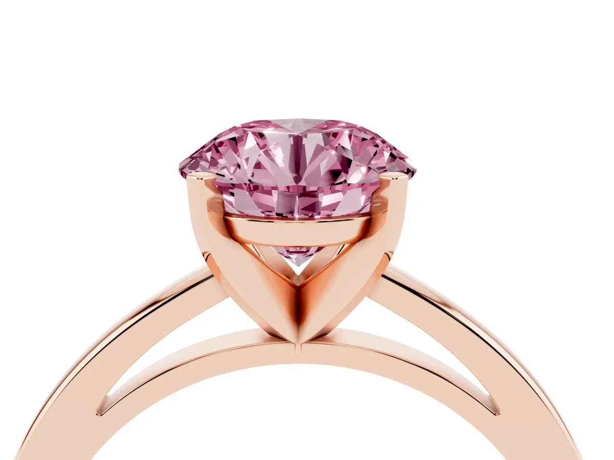Fancy Pink Round Cut Solitaire Diamond Engagement Ring with Four-Prong Setting on a Classic Band Rose gold