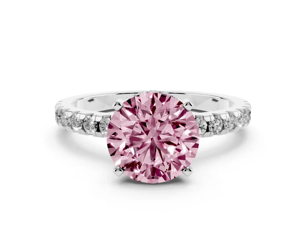 Fancy Pink Round Cut Diamond Solitaire Ring with Round Pavé Band and Four-Prong Setting Silver