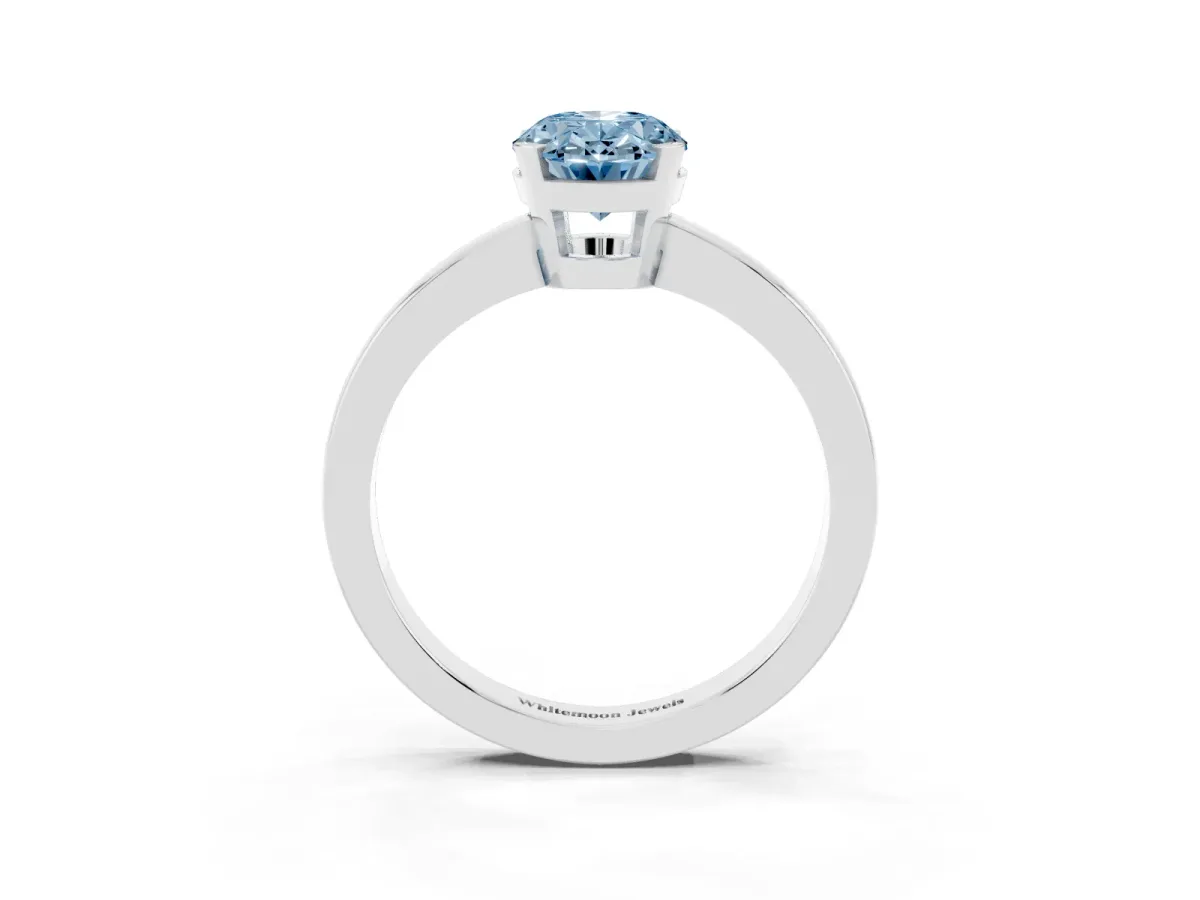 Fancy Blue Oval Cut Cut Solitaire Ring with Four-Prong Setting and Classic Band Silver