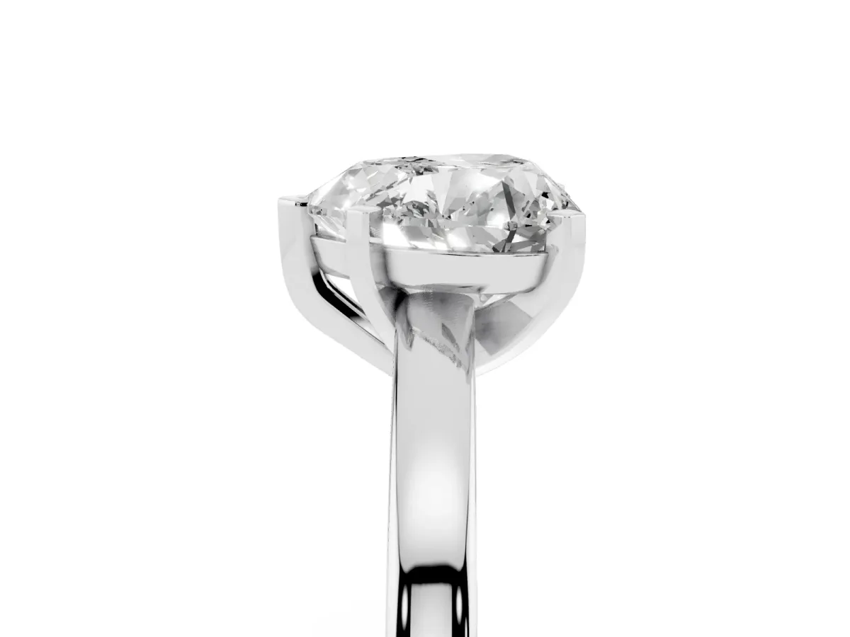Heart Cut Solitaire Diamond Engagement Ring with Four-Prong Setting on a Classic Band Silver