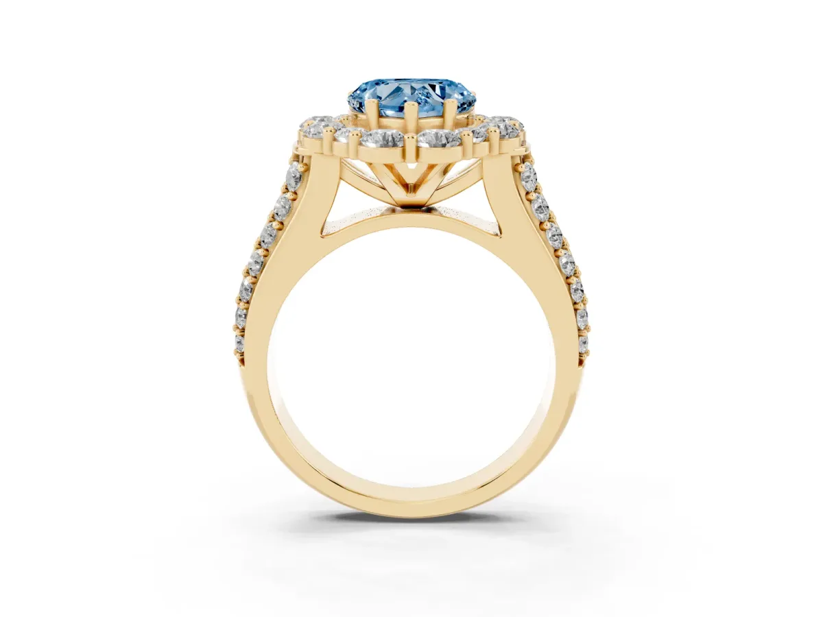 Fancy Blue Heart Cut Halo Diamond Engagement Ring with Split Shank and Prong Setting Yellow gold
