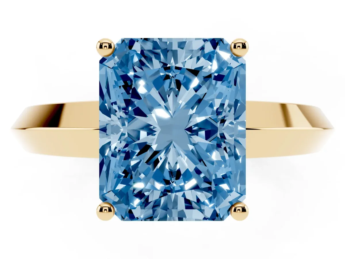 Fancy Blue Radiant Cut Cut Solitaire Engagement Ring with Flat Band and Four-Prong Setting Yellow gold