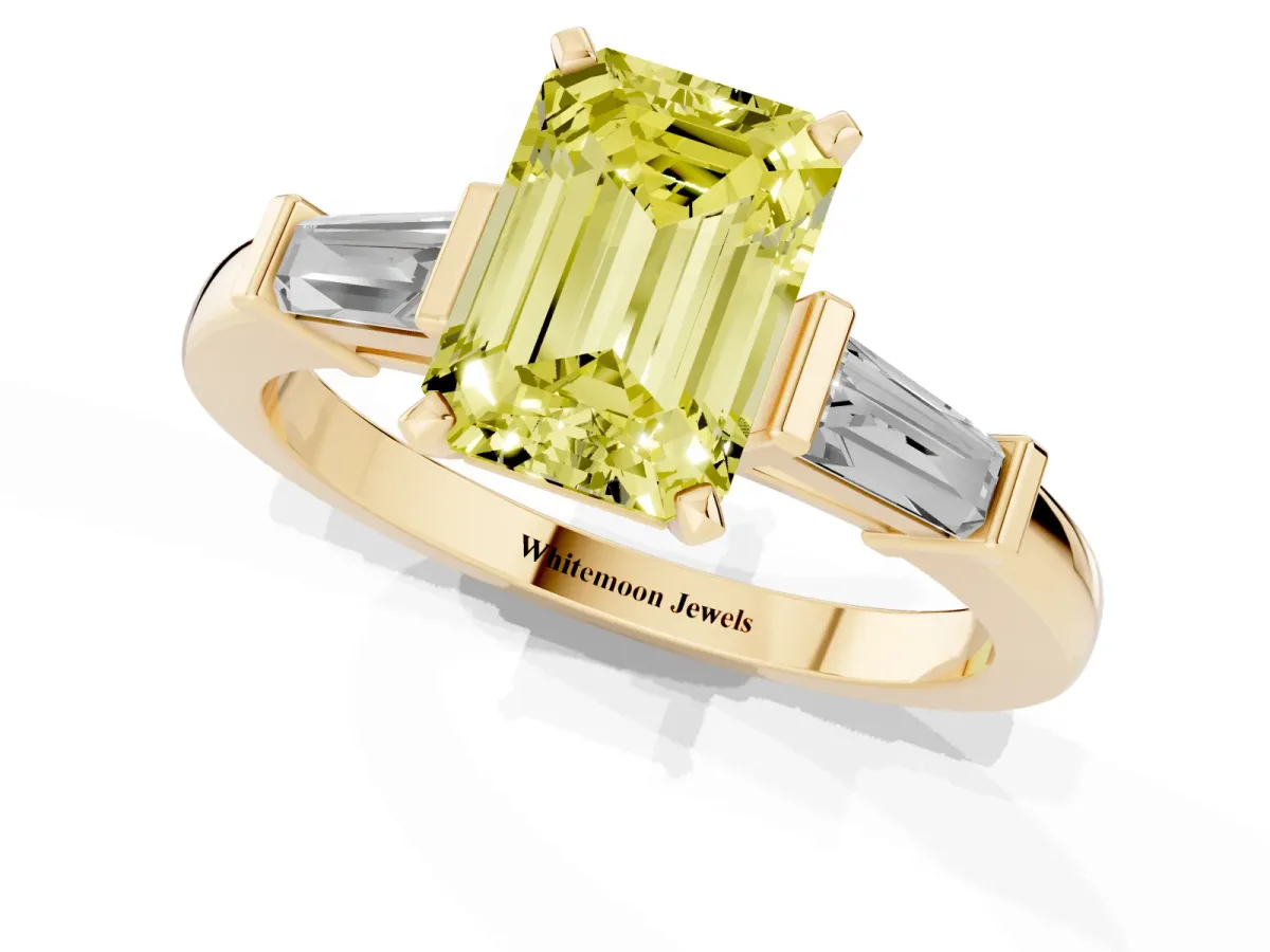 Fancy Yellow Emerald Cut Cut Diamond Solitaire Ring with Tapered Baguette Accents and Four-Prong Setting Yellow gold