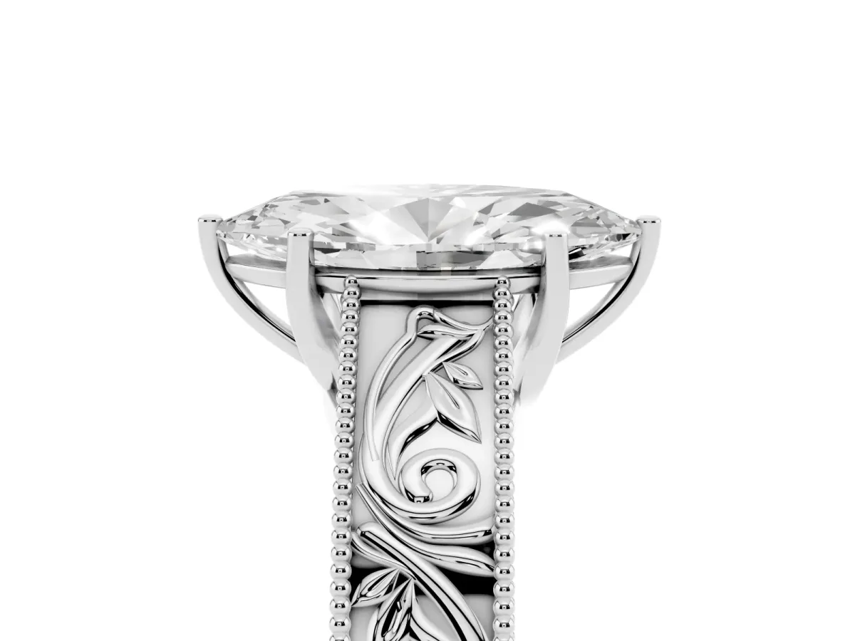Marquise Cut Diamond Solitaire Ring with Engraved Band and Four-Prong Setting Silver