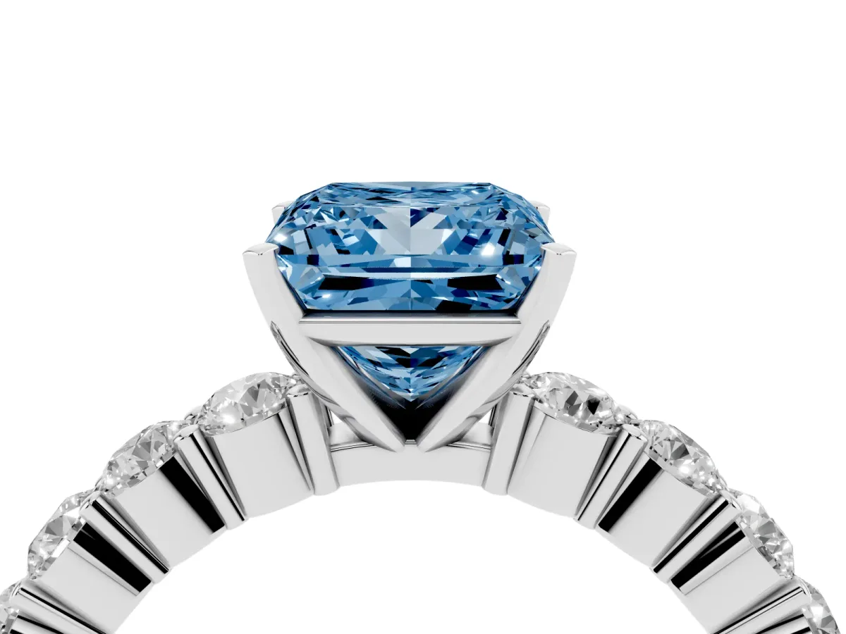 Fancy Blue Princess Cut Diamond Solitaire Ring with Shared Prong Round Side Stones Platinum