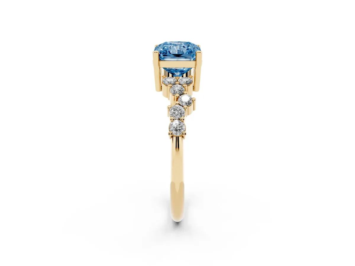 Fancy Blue Radiant Cut Diamond Scattered Round Accent Ring with Prong Setting Yellow gold