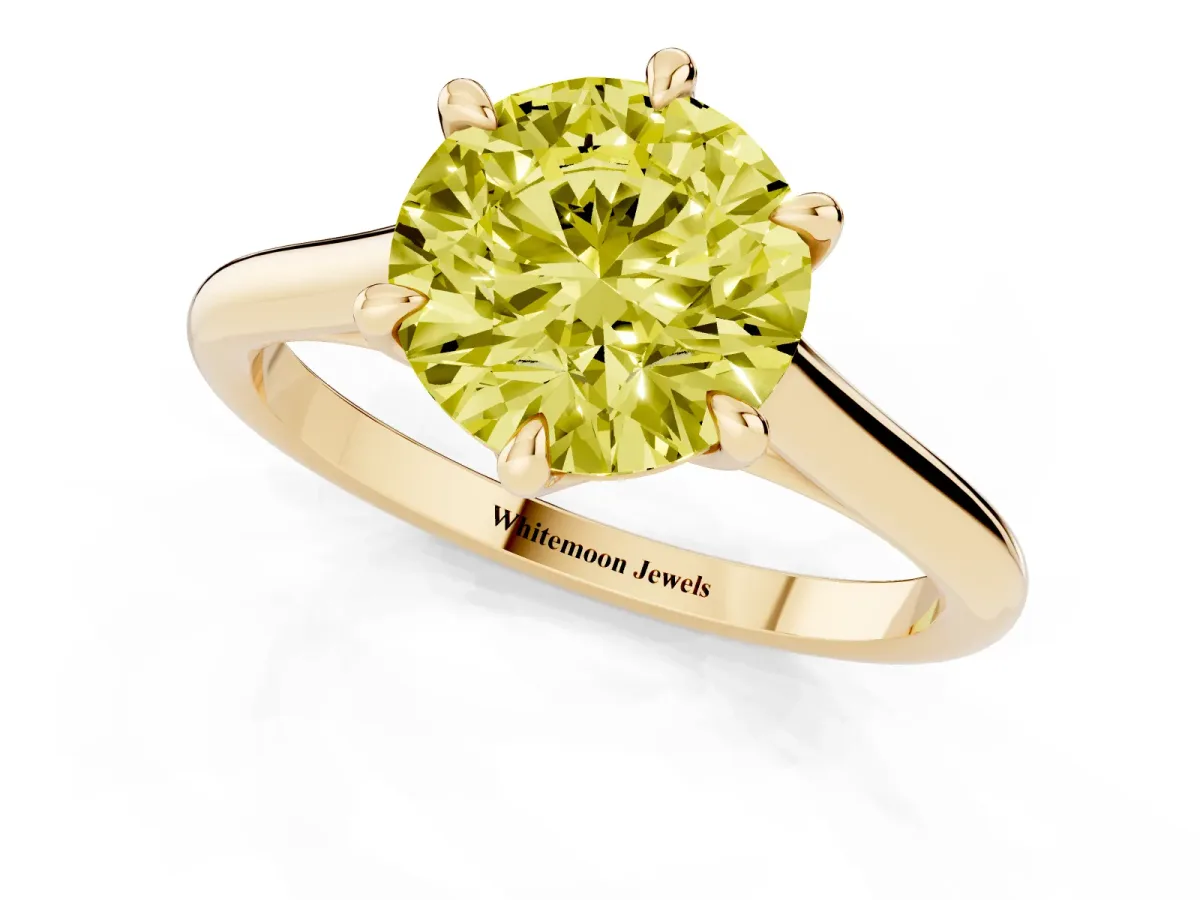 Fancy Yellow Round Cut Solitaire Engagement Ring with Six-Prong Setting and Classic Band Yellow gold