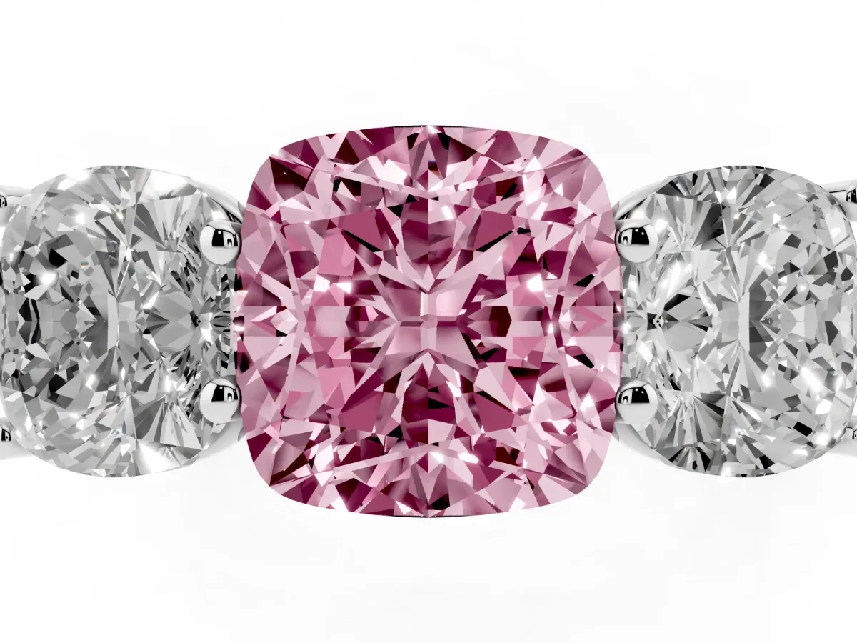 Fancy Pink Cushion Cut Three-Stone Diamond Ring with Prong Setting on a Classic Band Platinum