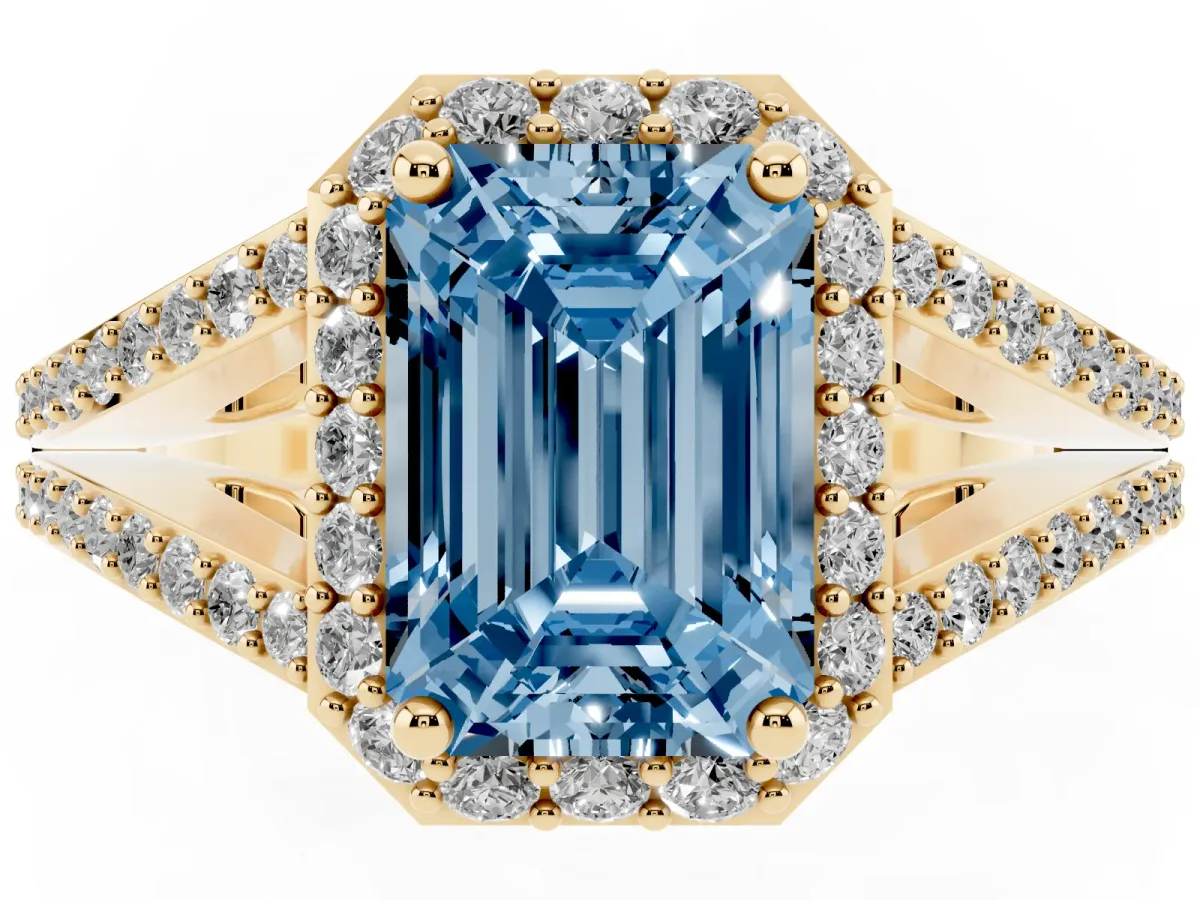 Fancy Blue Emerald Cut Halo Split Shank Pave Diamond Ring with Four-Prong Setting Yellow gold