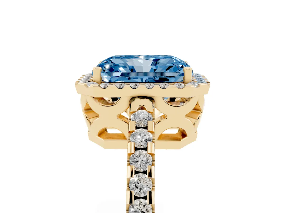 Fancy Blue Radiant Cut Diamond Halo Engagement Ring with Pavé Band and Prong Setting Yellow gold