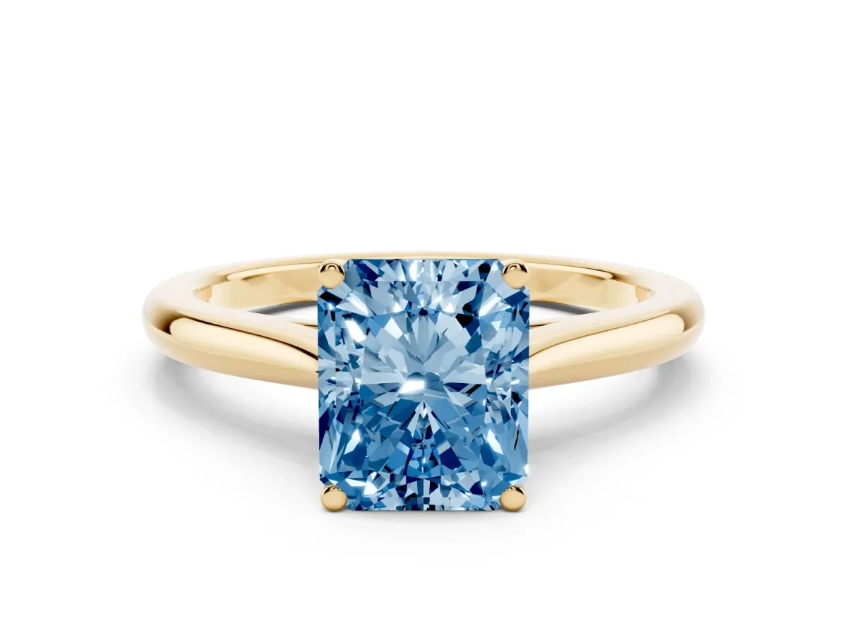 Fancy Blue Radiant Cut Cut Solitaire Ring with Cathedral Band and Four-Prong Setting Yellow gold