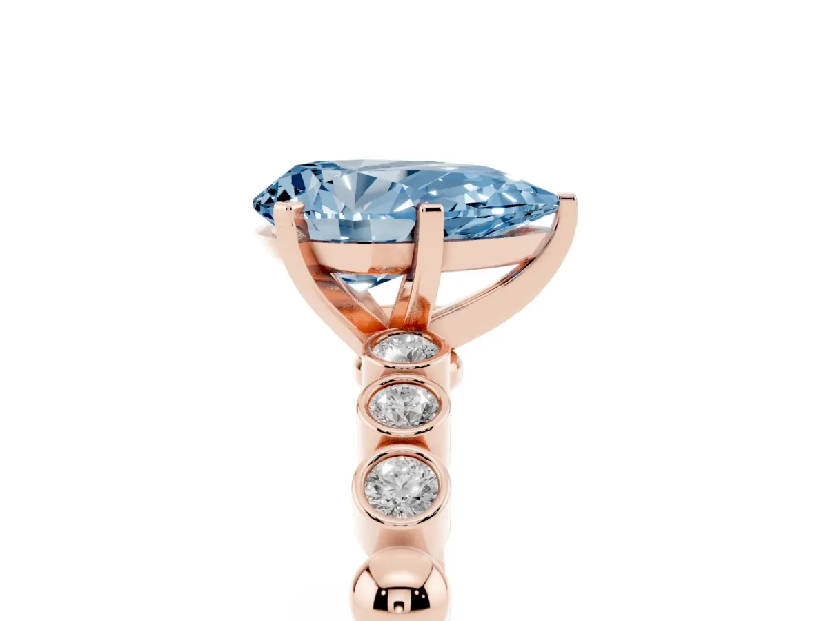 Fancy Blue Pear Cut Solitaire Bezel Accent Diamond Engagement Ring with Beaded Band and Four-Prong Setting Rose gold