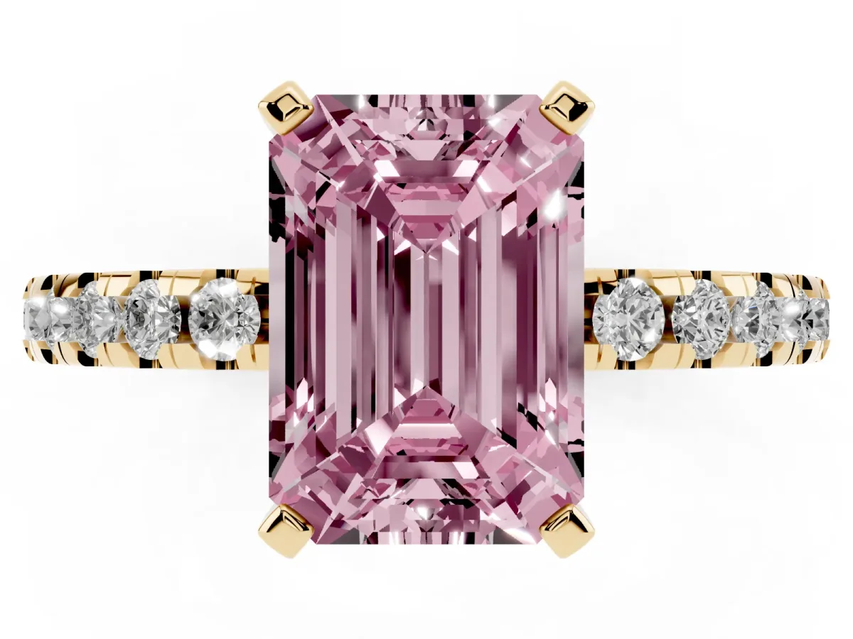 Fancy Pink Emerald Cut Diamond Solitaire Ring with Round Pavé Band and Four-Prong Setting Yellow gold