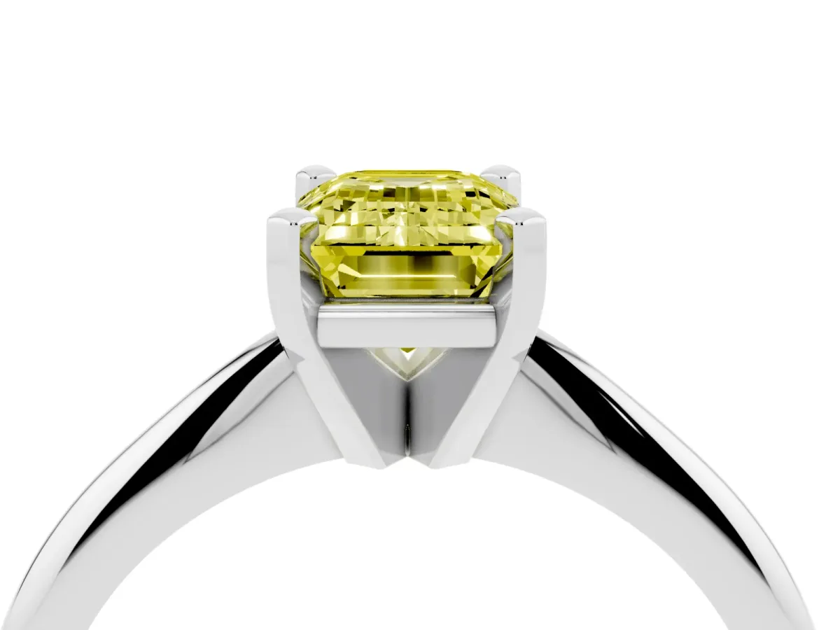 Fancy Yellow Emerald Cut Cut Solitaire Ring with Four-Prong Setting on a Classic Band Silver