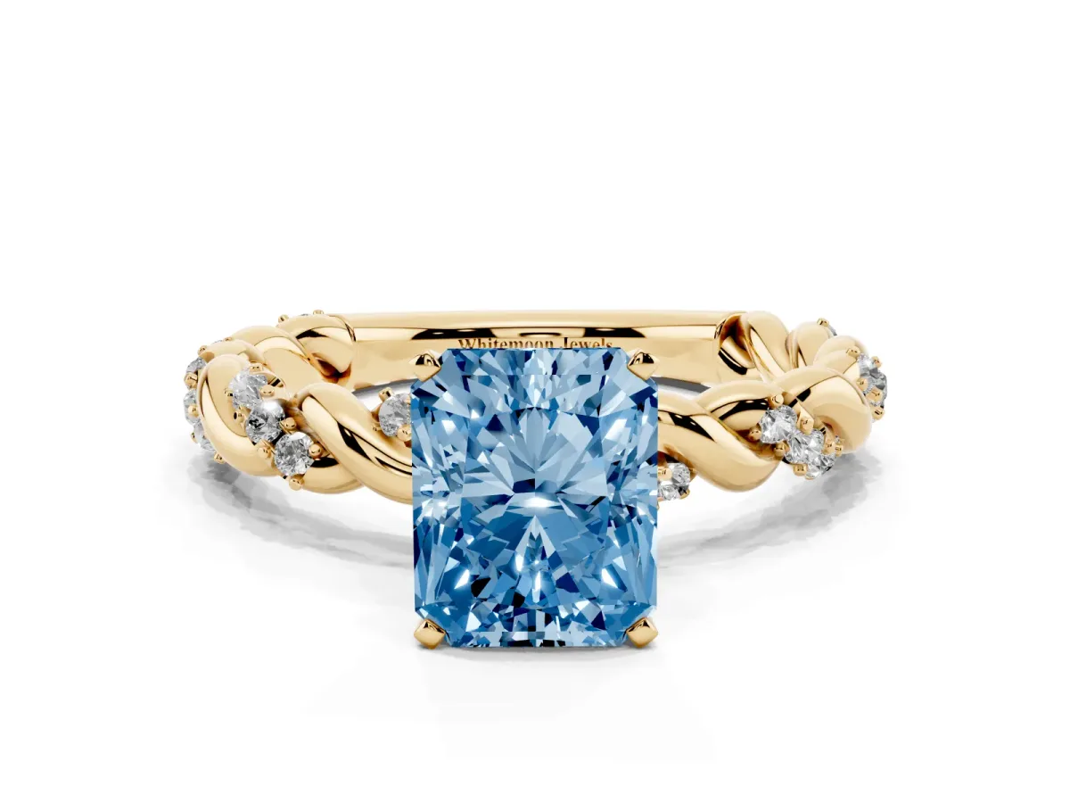 Fancy Blue Radiant Cut Diamond Solitaire Ring with Twisted Band and Pavé Accents Yellow gold