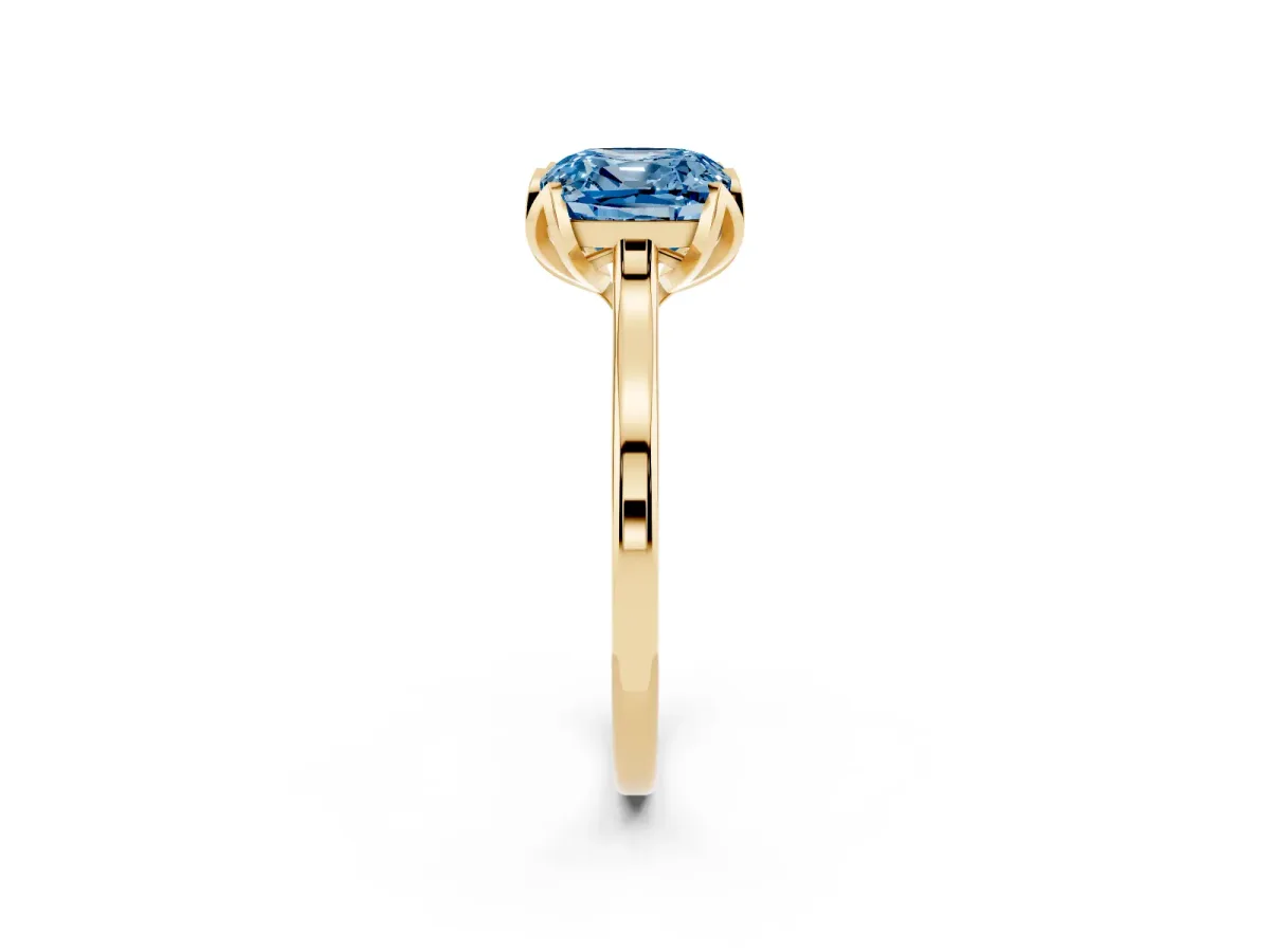 Fancy Blue Cushion Cut Diamond Solitaire Ring with Flower Prong Setting and Classic Band Yellow gold