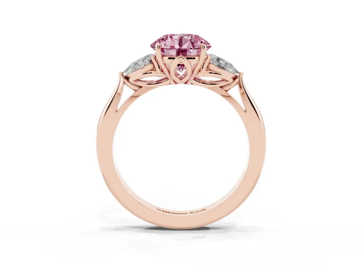 Fancy Pink Three-Stone Round Cut Diamond Ring with Pear Side Stones in Four-Prong Setting Rose gold