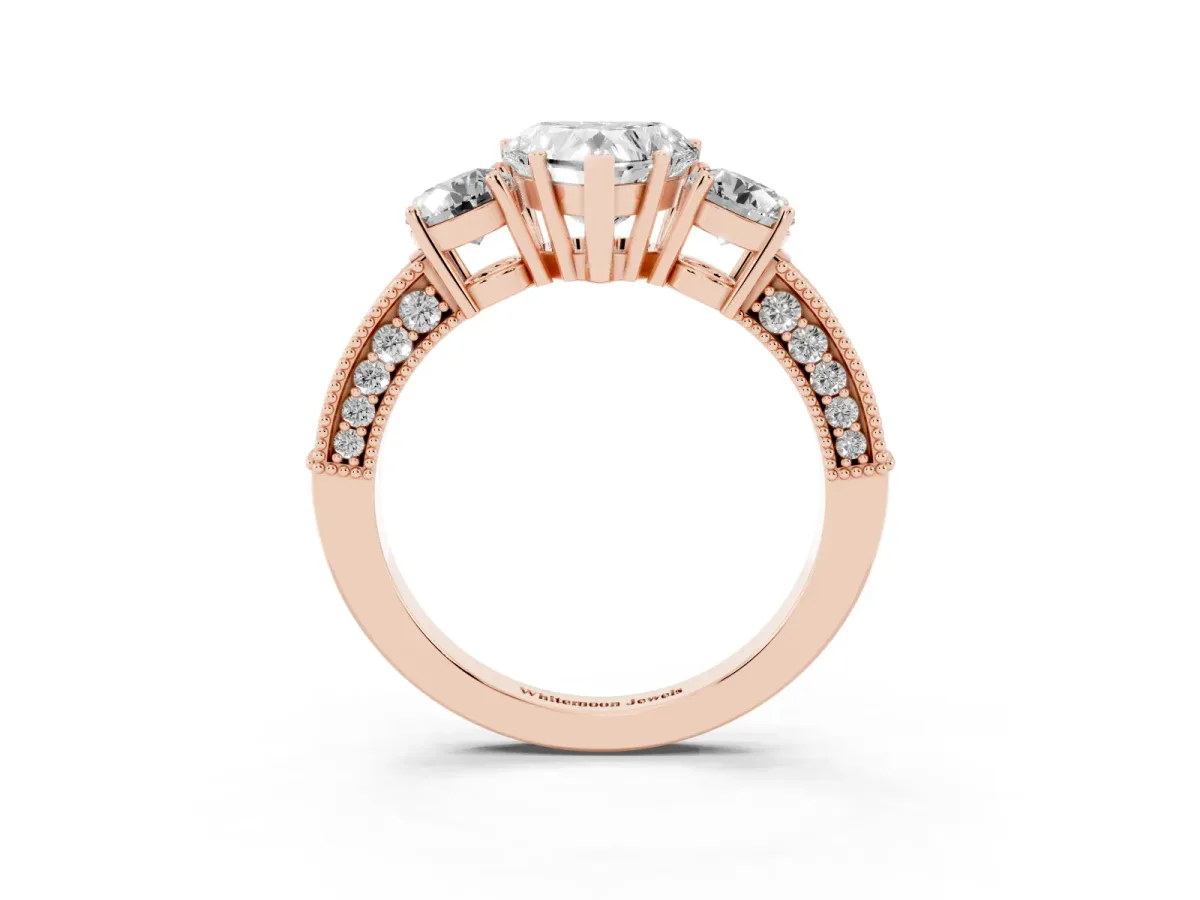 Heart Cut Three-Stone Diamond Ring with Pavé Band and Four-Prong Setting Rose gold