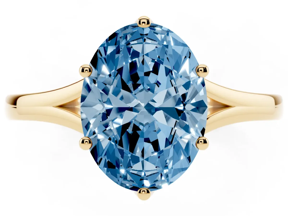 Fancy Blue Oval Cut Solitaire Diamond Ring with Six-Prong Setting and Tapered Band Yellow gold