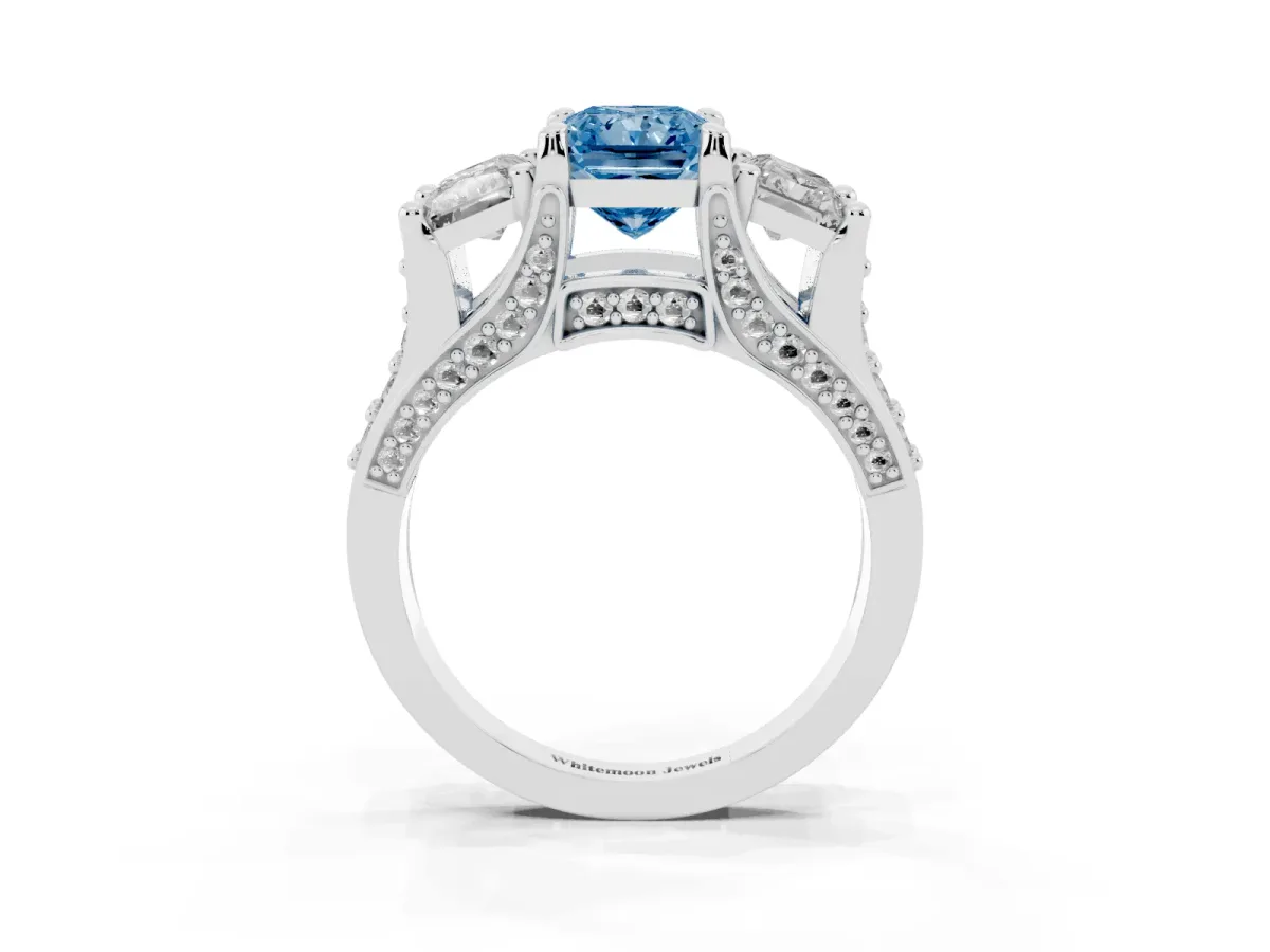 Fancy Blue Radiant Cut Diamond Three-Stone Ring with Channel Set Band and Four-Prong Setting Silver