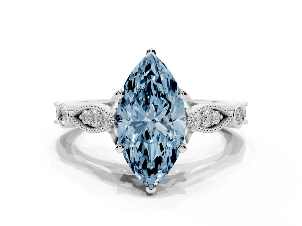 Fancy Blue Marquise Cut Cut Diamond with Milgrain Marquise and Bezel Accents on a Solitaire Band with Prong Setting Silver