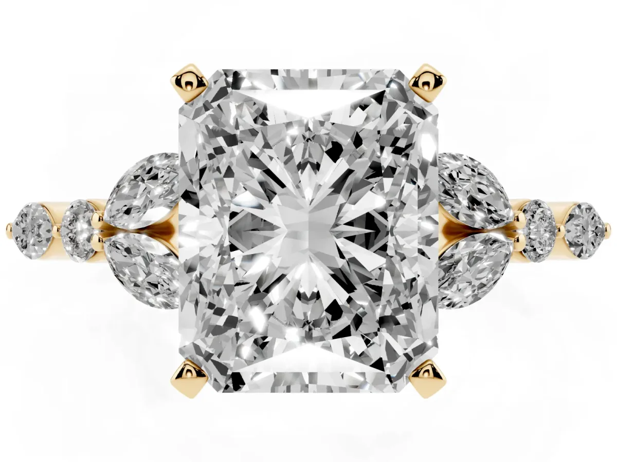 Radiant Cut Diamond Solitaire Ring with Side Stones and Four-Prong Setting Yellow gold