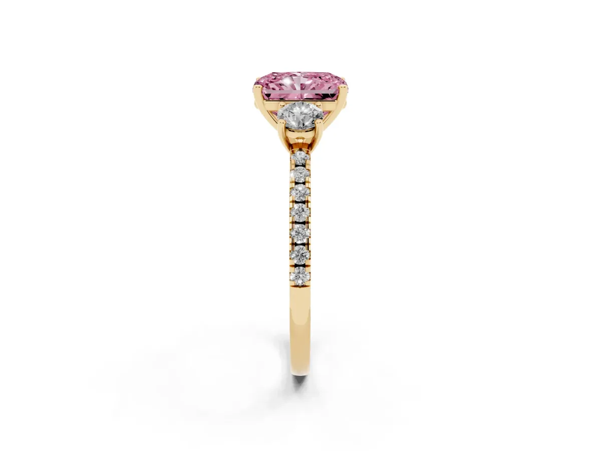Fancy Pink Three-Stone Radiant Cut Cut Diamond Pavé Band with Prong Setting Yellow gold