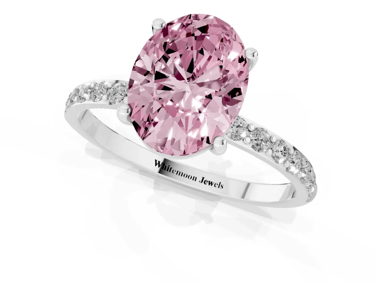Fancy Pink Oval Cut Diamond Solitaire Ring with Round Pavé Shoulders and Prong Setting Silver