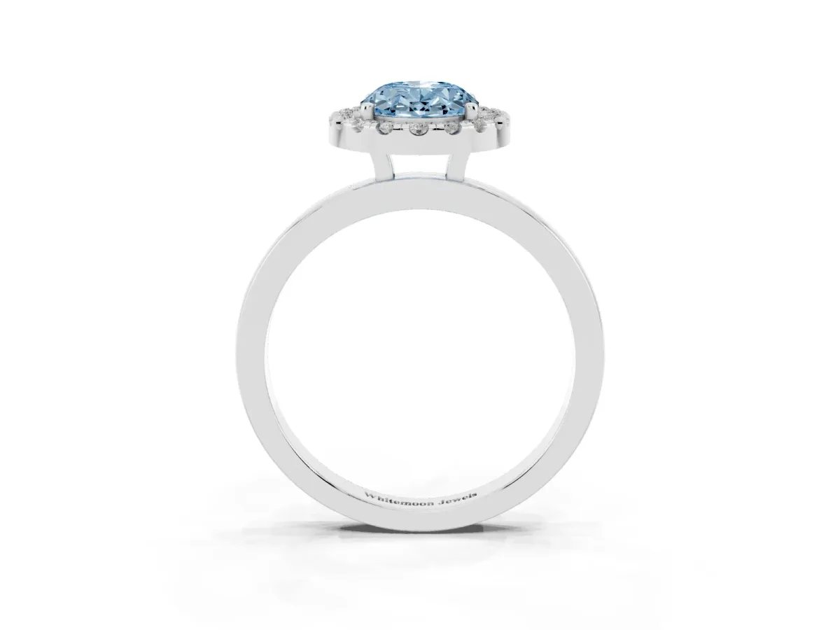 Fancy Blue Oval Cut Halo Diamond Solitaire with Pavé Band and Four-Prong Setting White gold