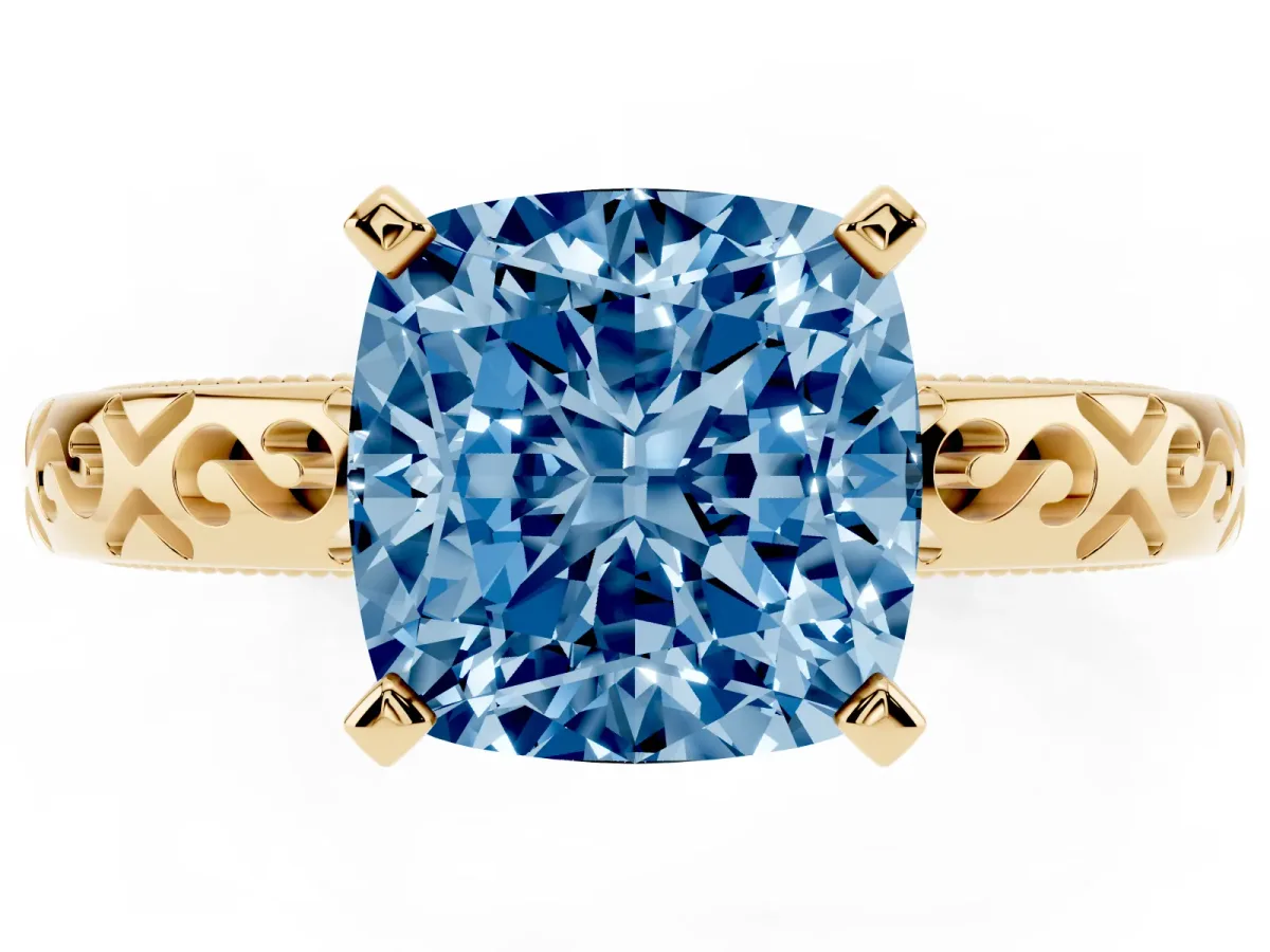 Fancy Blue Cushion Cut Solitaire Engagement Ring with Scrollwork Band and Four-Prong Setting Yellow gold