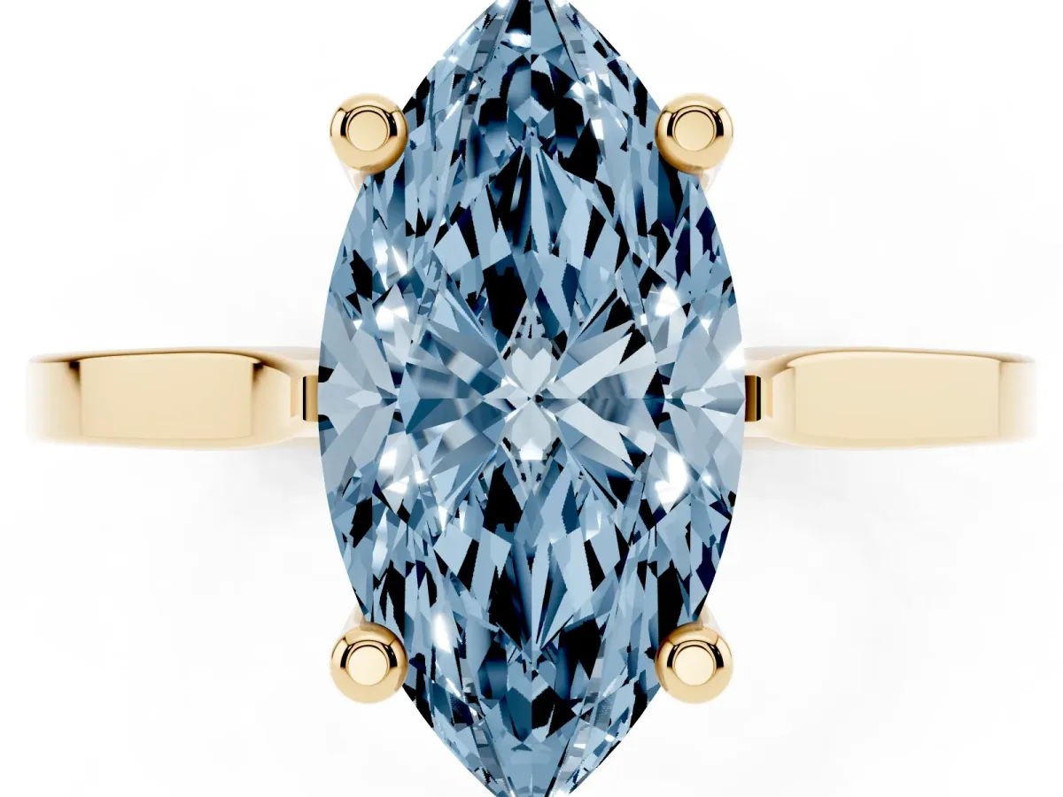 Fancy Blue Marquise Cut Solitaire Diamond Ring with Four-Prong Setting and Tapered Band Yellow gold