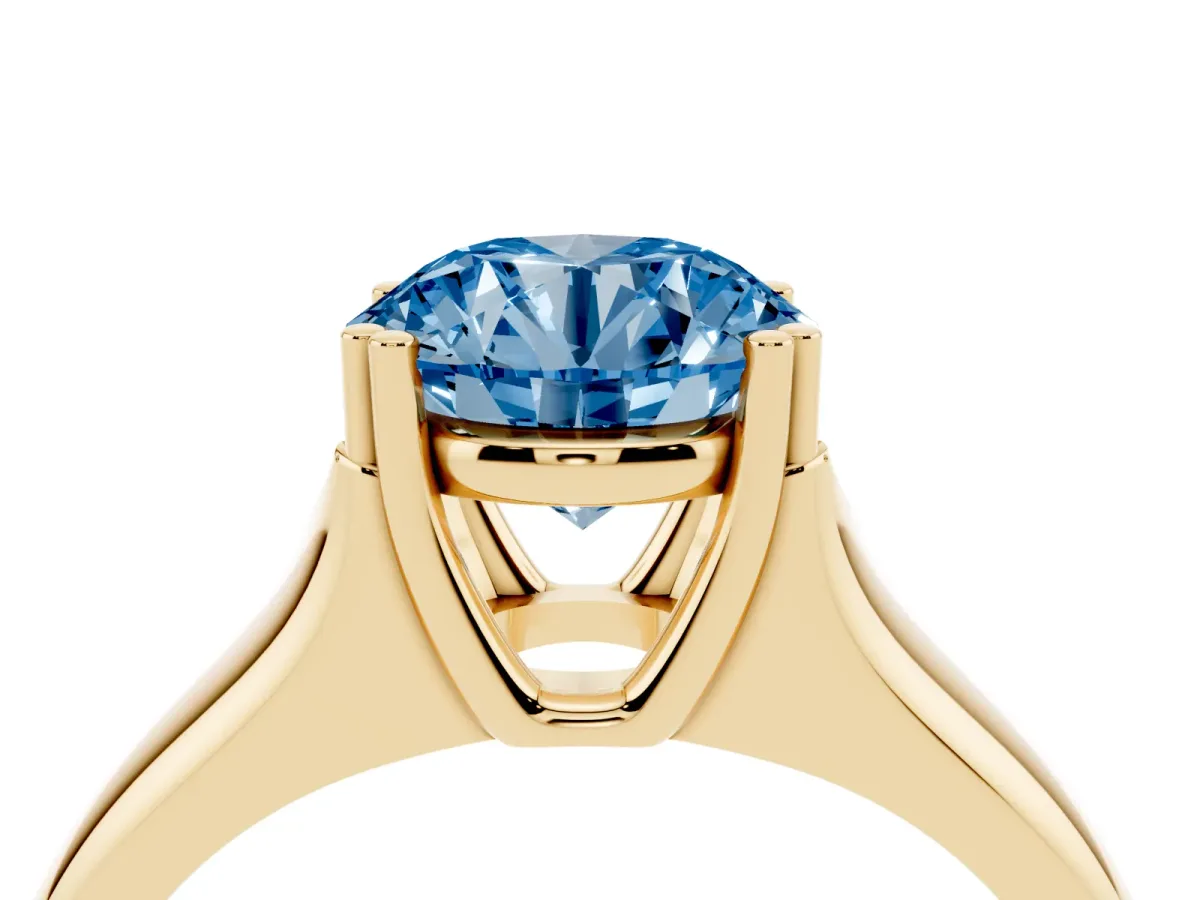 Fancy Blue Round Cut Diamond Solitaire Ring with Wide Band and Prong Setting Yellow gold