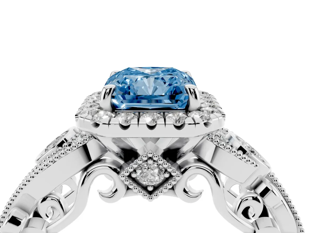 Fancy Blue Radiant Cut Halo Diamond Ring with Milgrain and Bezel Accents on a Split Shank Band Platinum