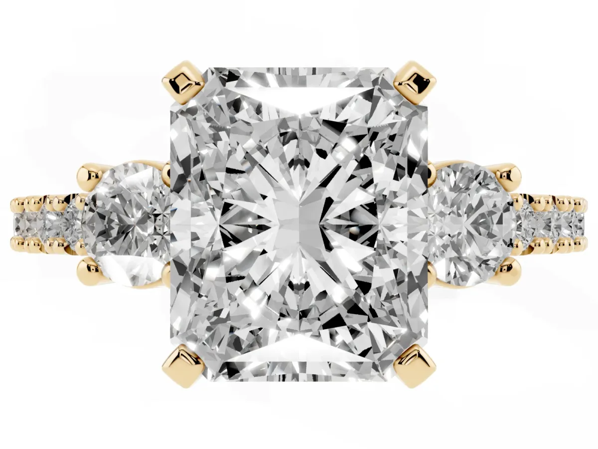Radiant Cut Three-Stone Diamond Pavé Band with Prong Setting Yellow gold