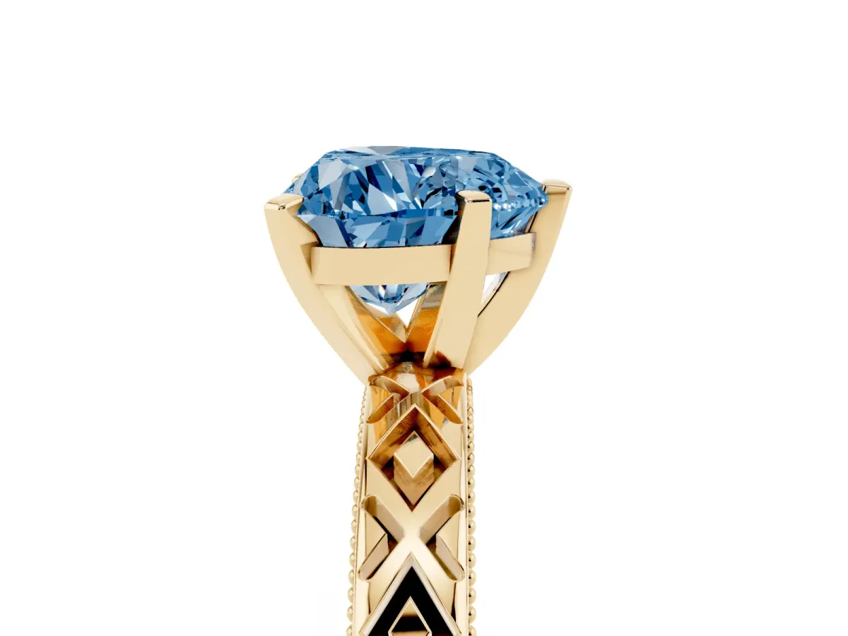 Fancy Blue Heart Cut Solitaire Diamond Ring with Milgrain and Black Enamel X Pattern Band Yellow gold