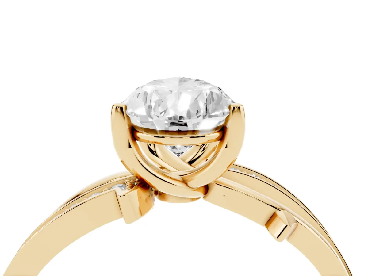 Pear Cut Solitaire Twist Band with Pavé Accents and Four-Prong Setting Yellow gold